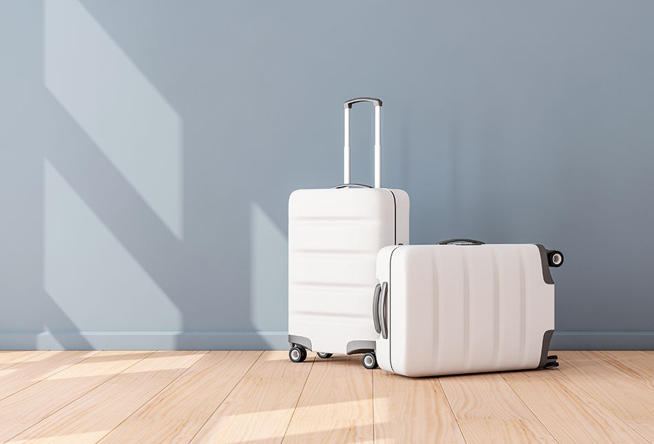 Two white suitcases with wheels